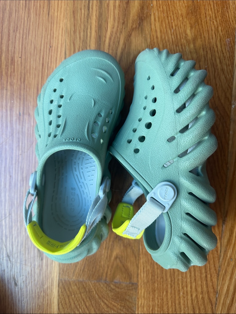 CROCS Kids Foam Clog in Sage Green with Yellow Heel Accent